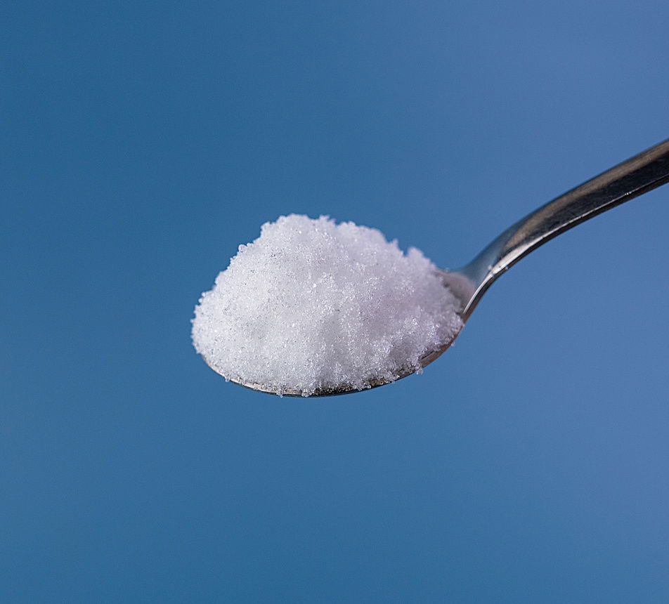 Xylitol lžička modré pozadí